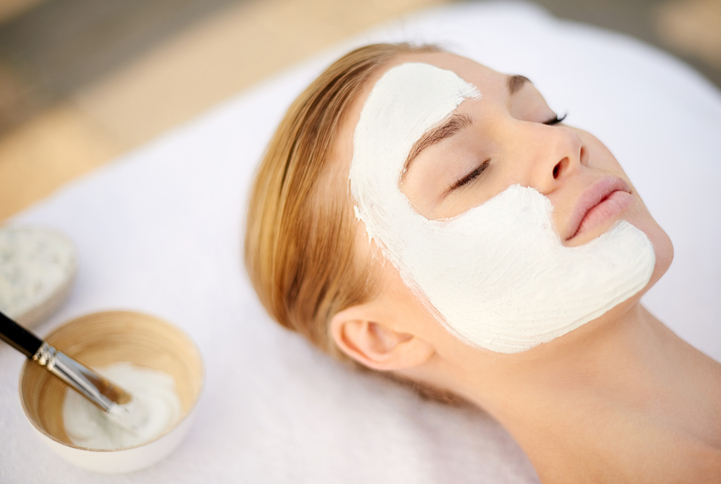 Indulging in a deep cleansing facial.