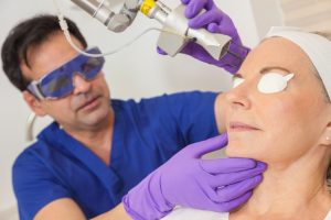 Laser skin rejuvination: Patient receiving laser treatment