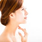 Young woman with youthful skin and neck. Mini neck lift.