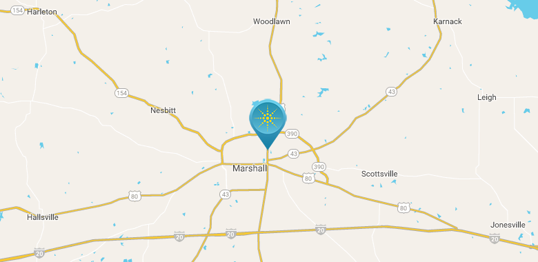 A map highlighting Marshall, Texas, with nearby towns and highways labeled