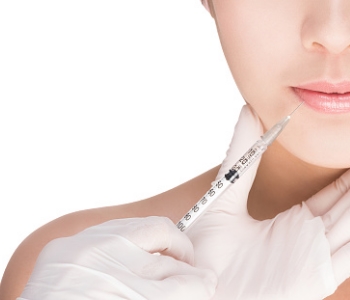 Woman being injected with syringe