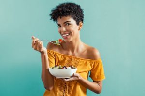 woman eating a healthy diet for skin health