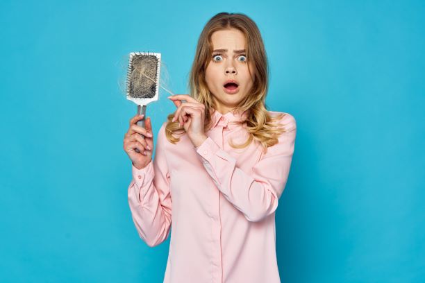 Woman with stress related hair loss