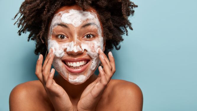 Woman performing at-home skin care routine