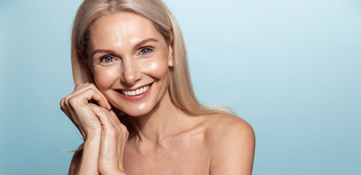 middle aged woman after collagen boosting treatment