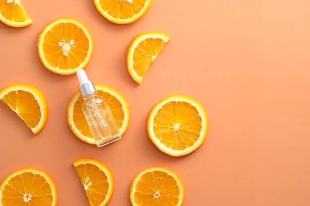 Vitamin C serum and oranges - what does vitamin c do for your skin?