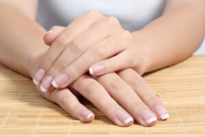 Wondering what your nails are saying about your health? Closeup view of healthy nails.