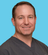 Dr. Dustin Wilkes is a Board-Certified Dermatologist serving patients in Weatherford, Texas at U.S. Dermatology Partners