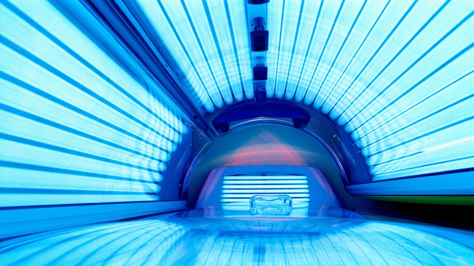 Gen Z Is Bringing Back The Tanning Bed—And Derms Have Serious Concerns